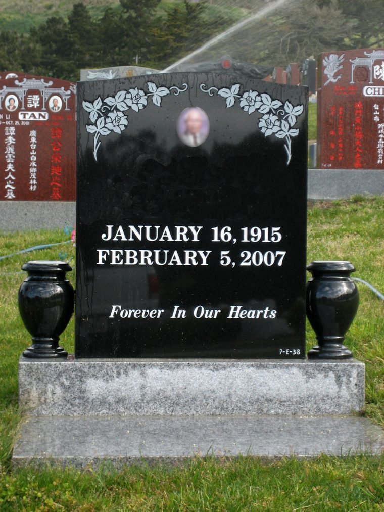 Granite vases set either side of a monument