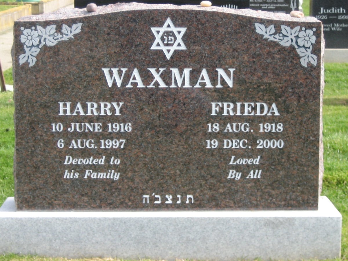 A double monument in red granite for a husband and wife